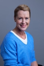 A person in a blue sweater

Description automatically generated with medium confidence